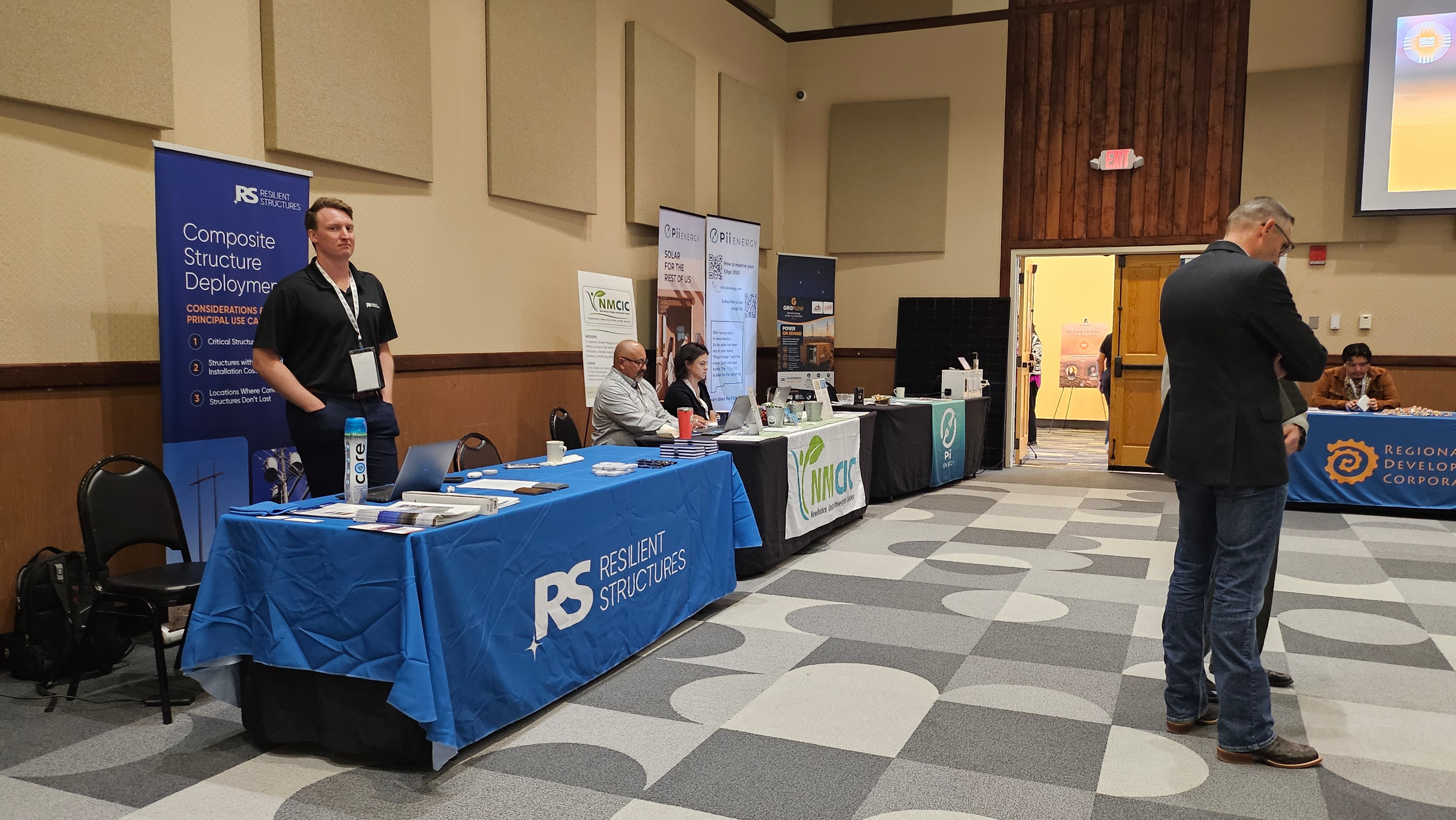 Exhibitor booths at the symposium